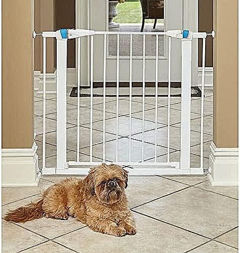 MidWest Homes for Pets 29 Inches Tall Walk-Though Steel Pet Gate, Pressure Mounted Dog Gate with Glow Strip Measures 29H x 29.5-38W Inches & Includes Two 3-Inch-Wide Extensions, White