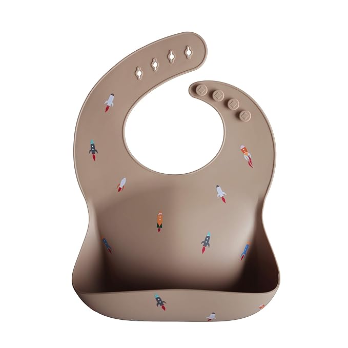 mushie Silicone Baby Bib | Adjustable Fit Waterproof Bibs (Rocket Ship)