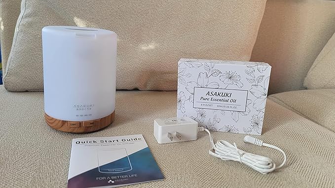 ASAKUKI Essential Oil Diffuser, Aromatherapy Cool Mist Home Humidifier with 7 LED Color Changing Light and Auto-Off Safety Switch, 8 Essential Oils Set, 300ml (Brown with Oils)